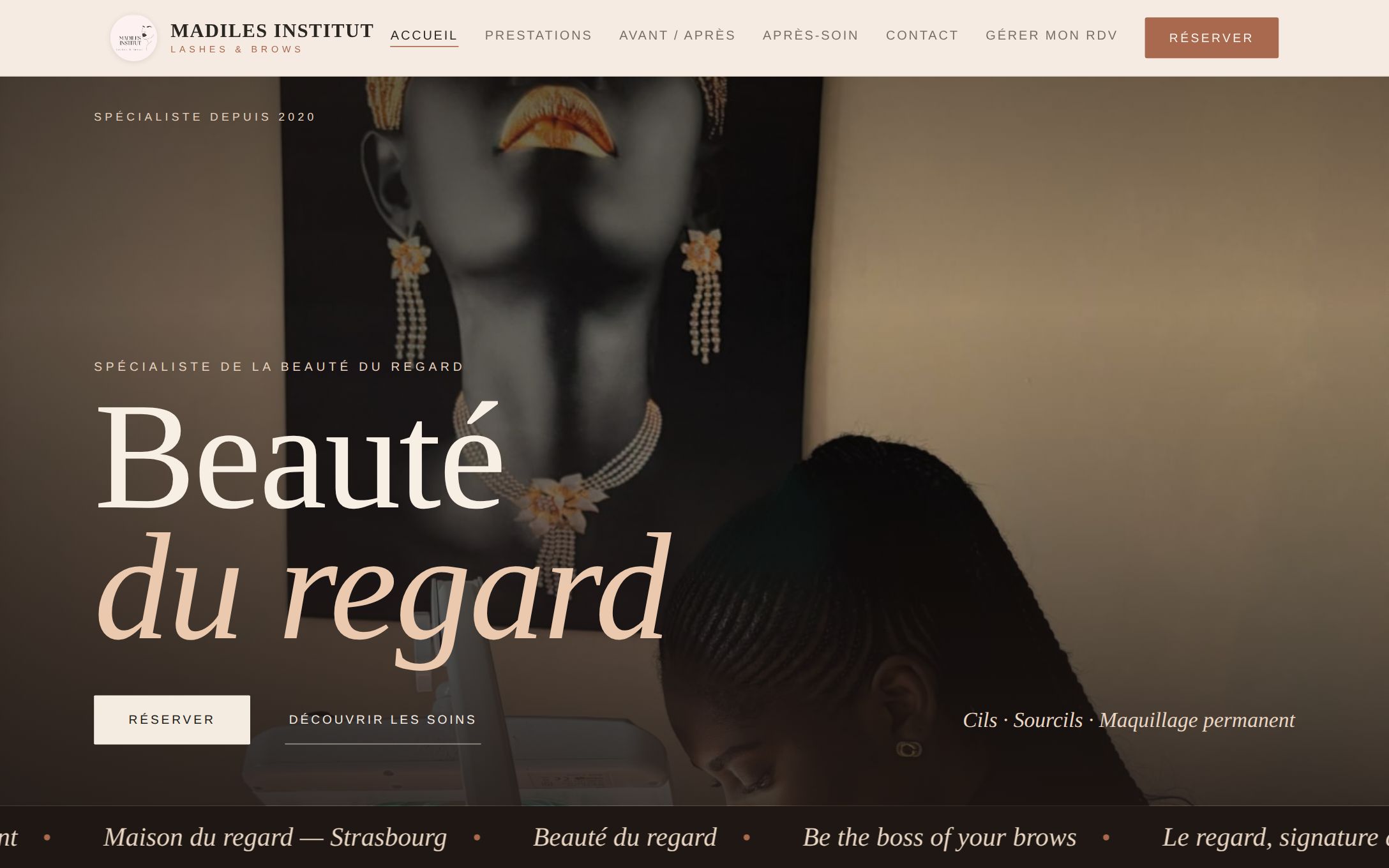Page d'accueil du site Madiles Institut : titre « Beauté du regard », photo de l'institut, bouton de réservation.